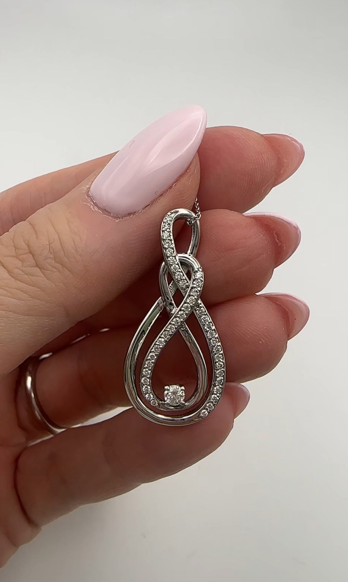 Modern Diamond Swirl Pendant
