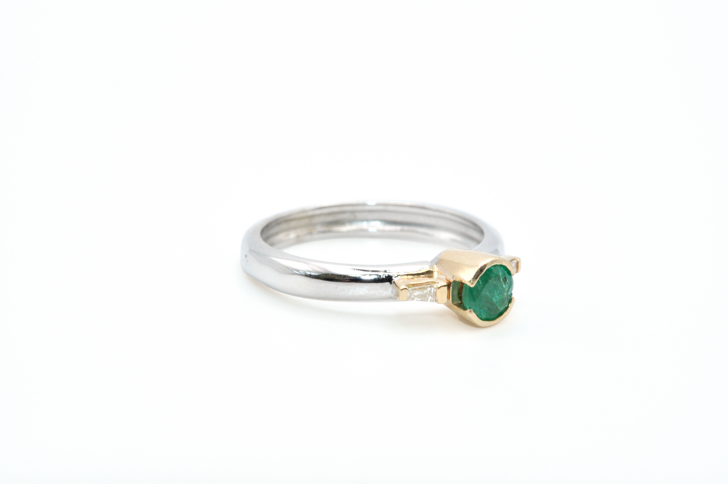 White Gold Emerald Ring with Yellow Gold Accents and Diamond Baguettes