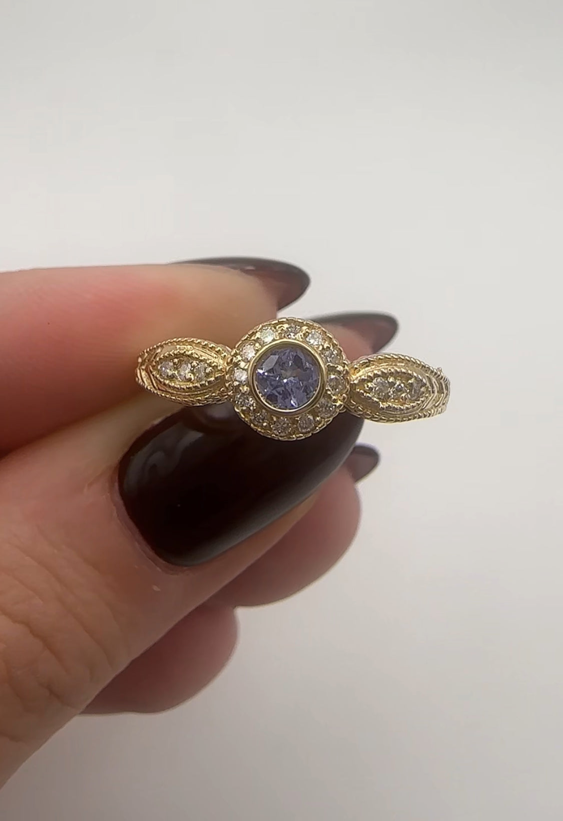 Yellow Gold Tanzanite Ring with Diamond Accents