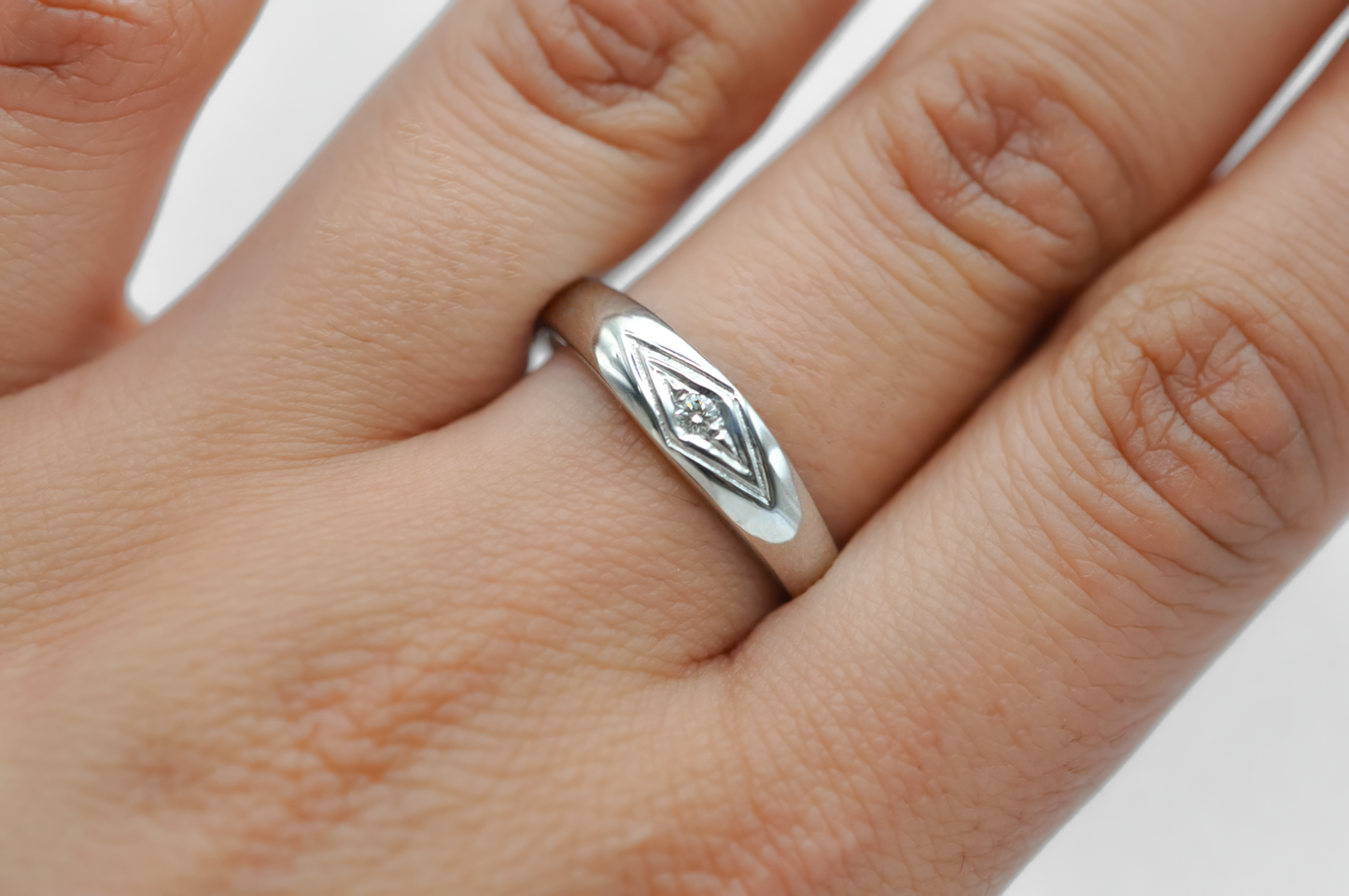 White Gold Ring with a Diamond Accent Stone