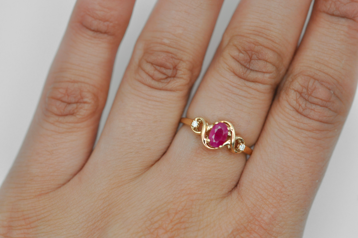 Yellow Gold Oval Ruby Ring with Side Diamond Accents