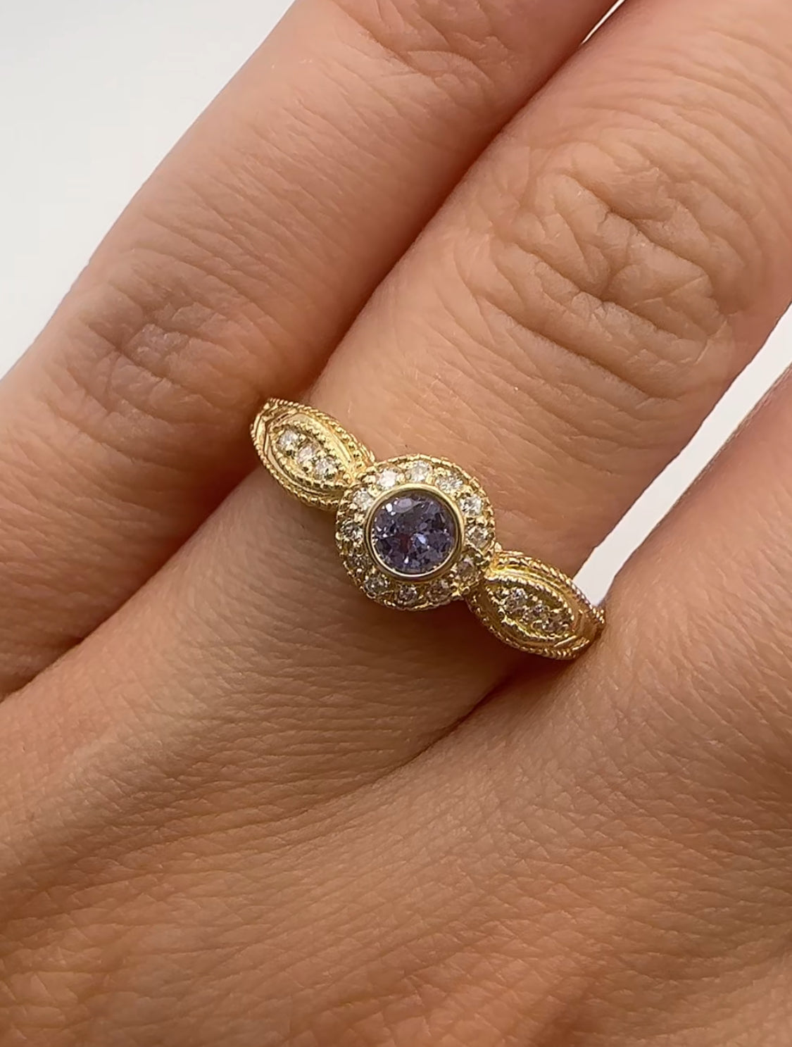 Yellow Gold Tanzanite Ring with Diamond Accents