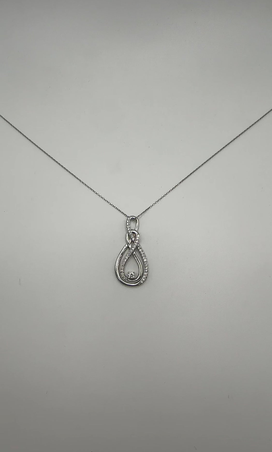 Modern Diamond Swirl Pendant