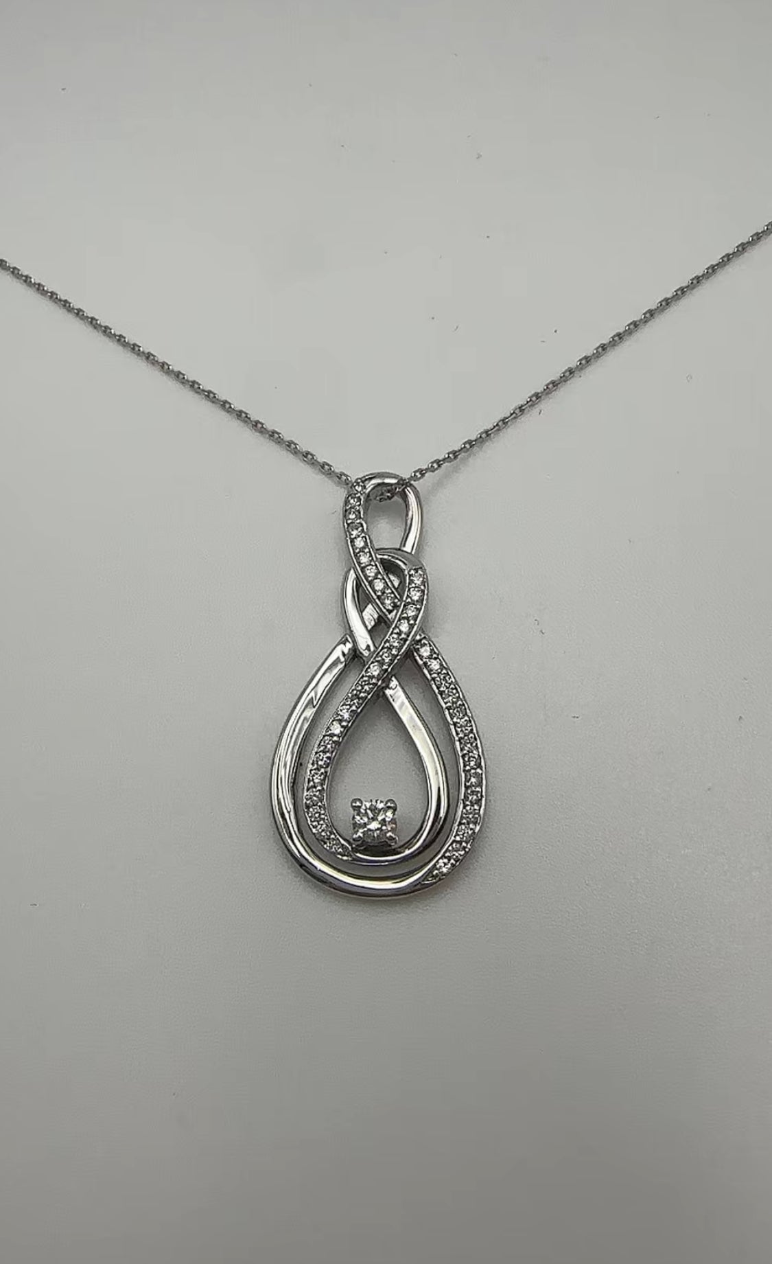 Modern Diamond Swirl Pendant