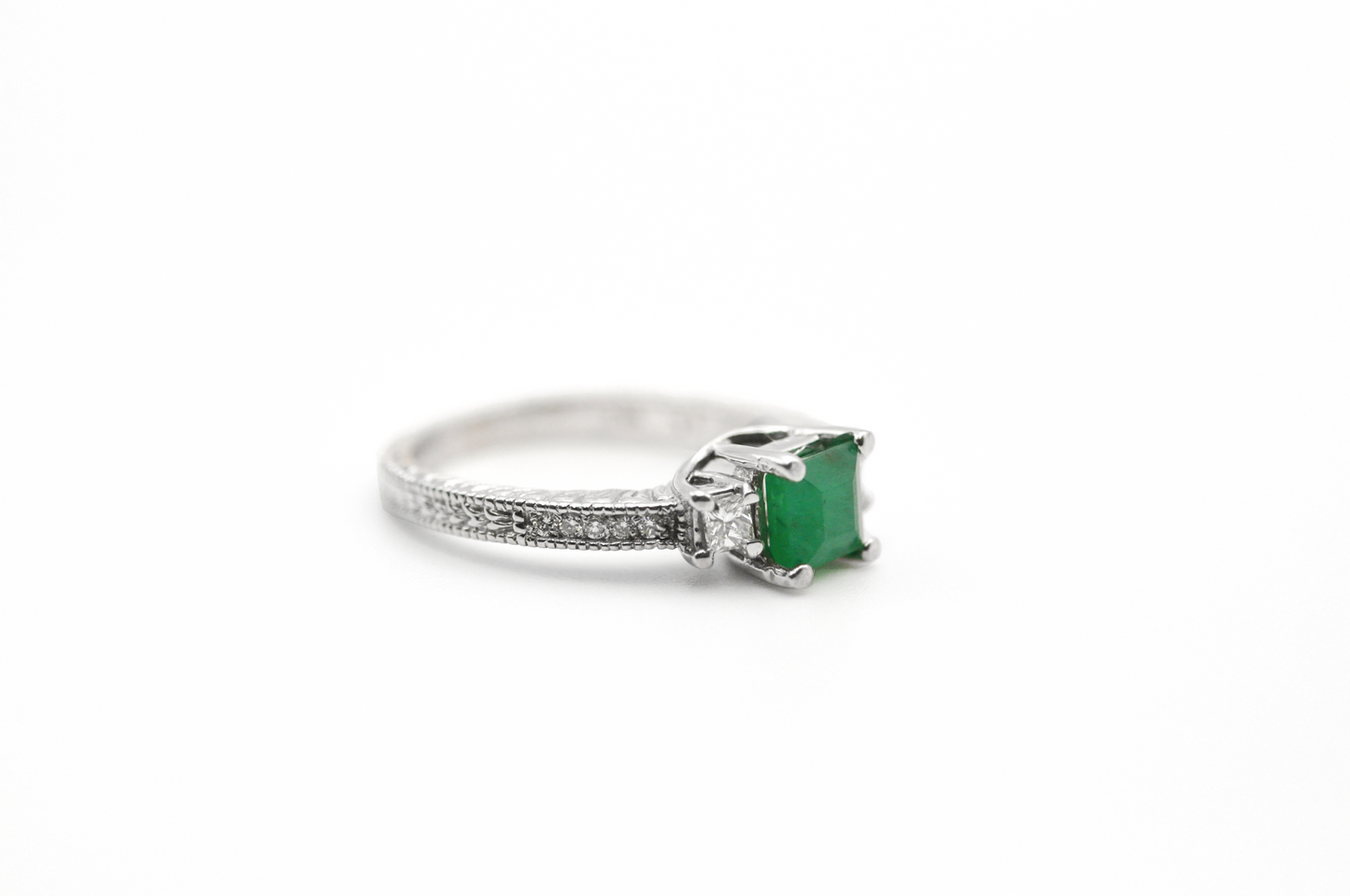 White Gold Emerald Ring with 2 Diamonds Side Stones