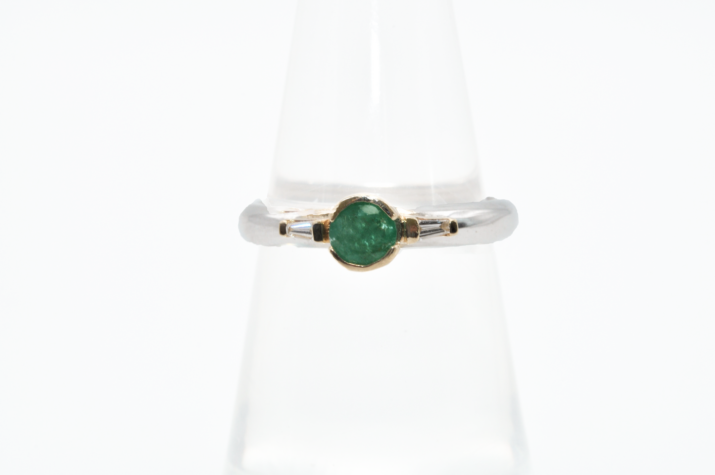 White Gold Emerald Ring with Yellow Gold Accents and Diamond Baguettes