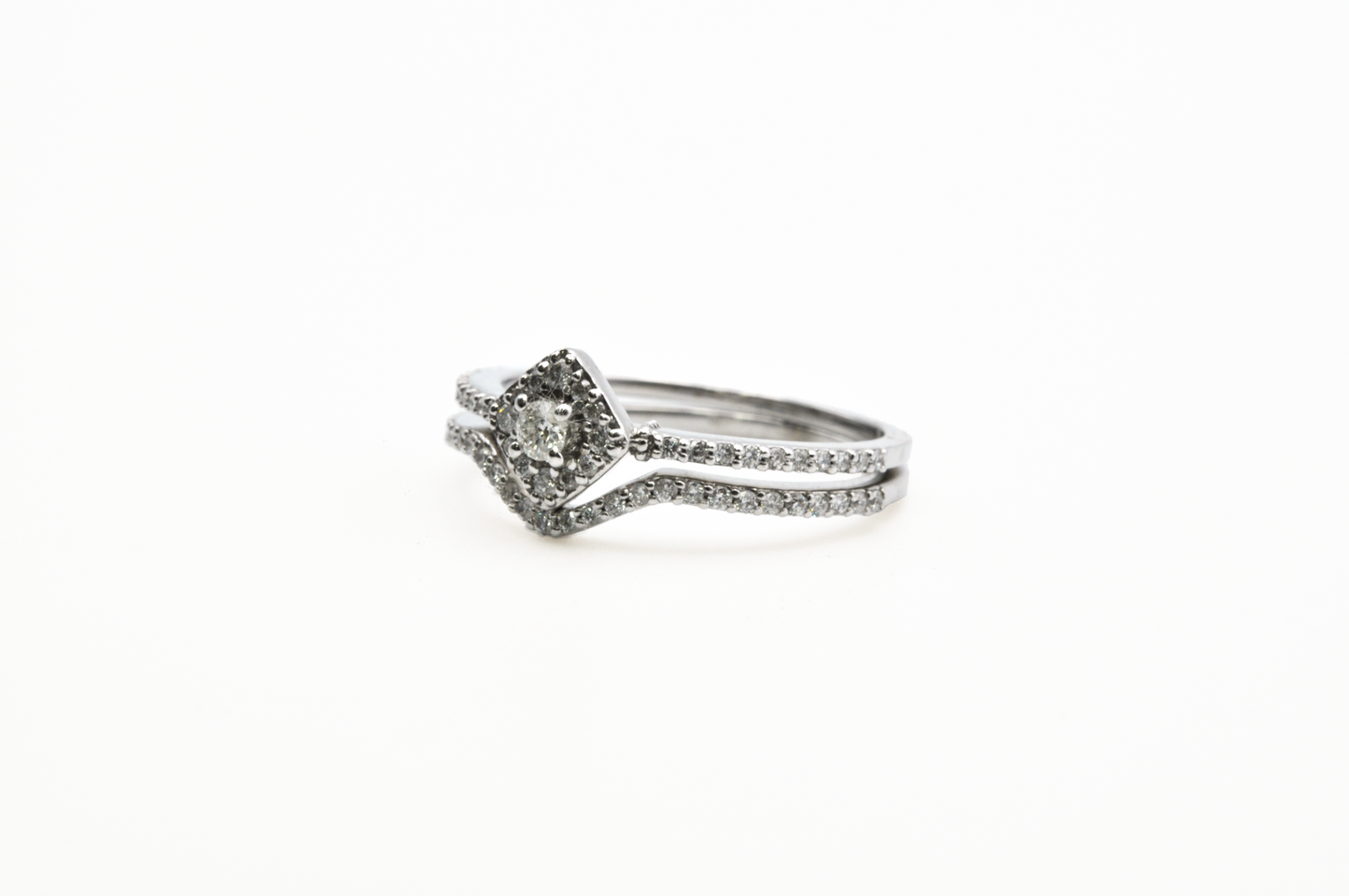 Beautiful White Gold Diamond Engagement Ring and a Curve Wedding Band