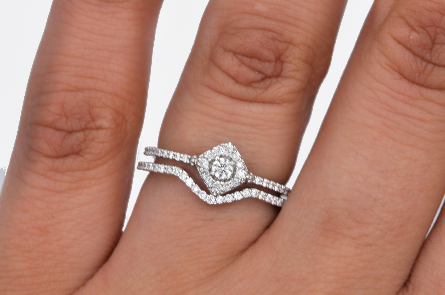 Beautiful White Gold Diamond Engagement Ring and a Curve Wedding Band