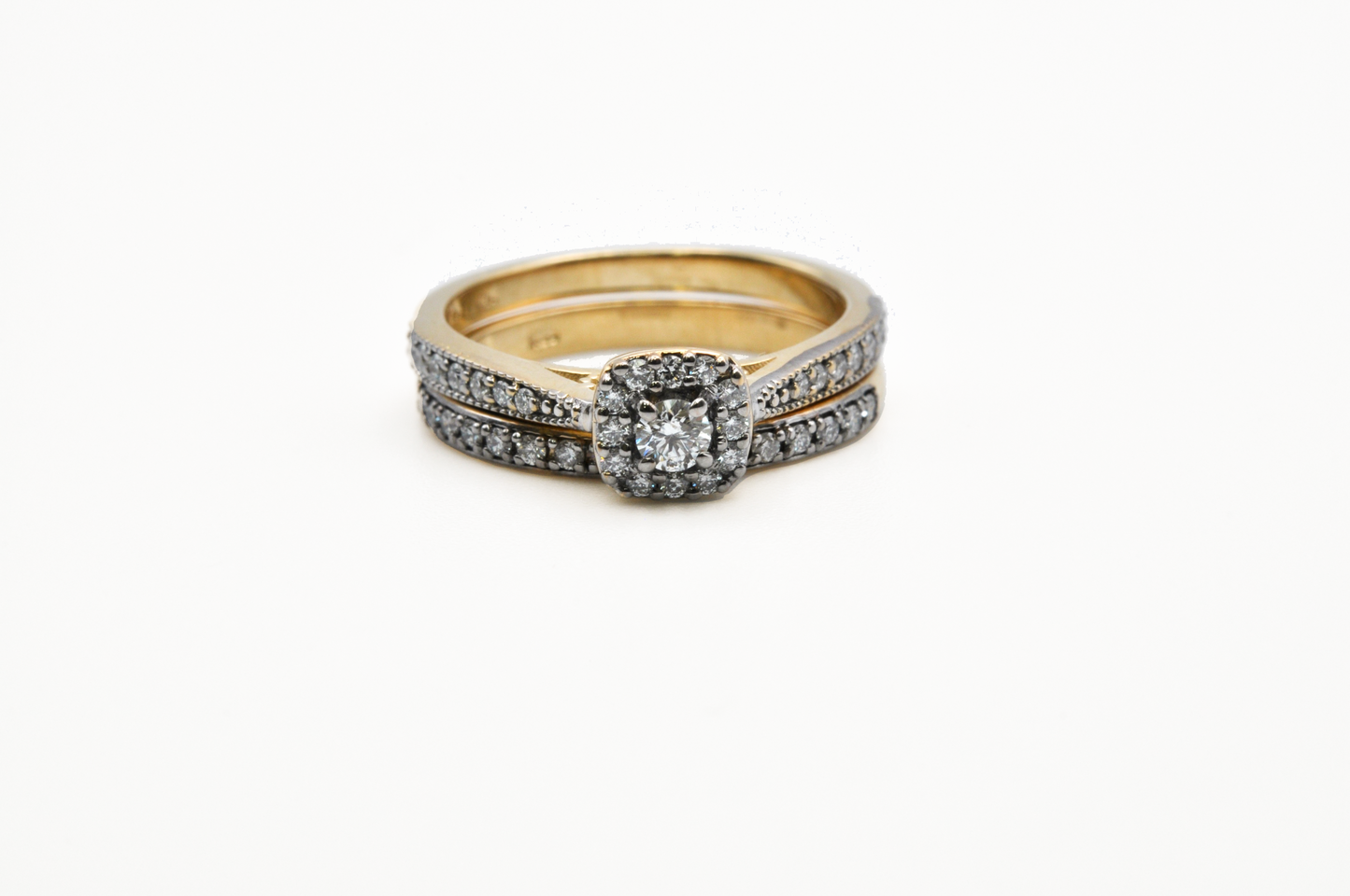 Yellow Gold Round Diamond with a Cushion Halo Engagement Ring and a Pave Diamond Wedding Band