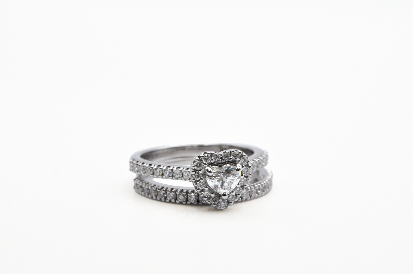 White Gold Heart Diamond with a Halo Engagement Ring and a Pave Diamond Wedding Band