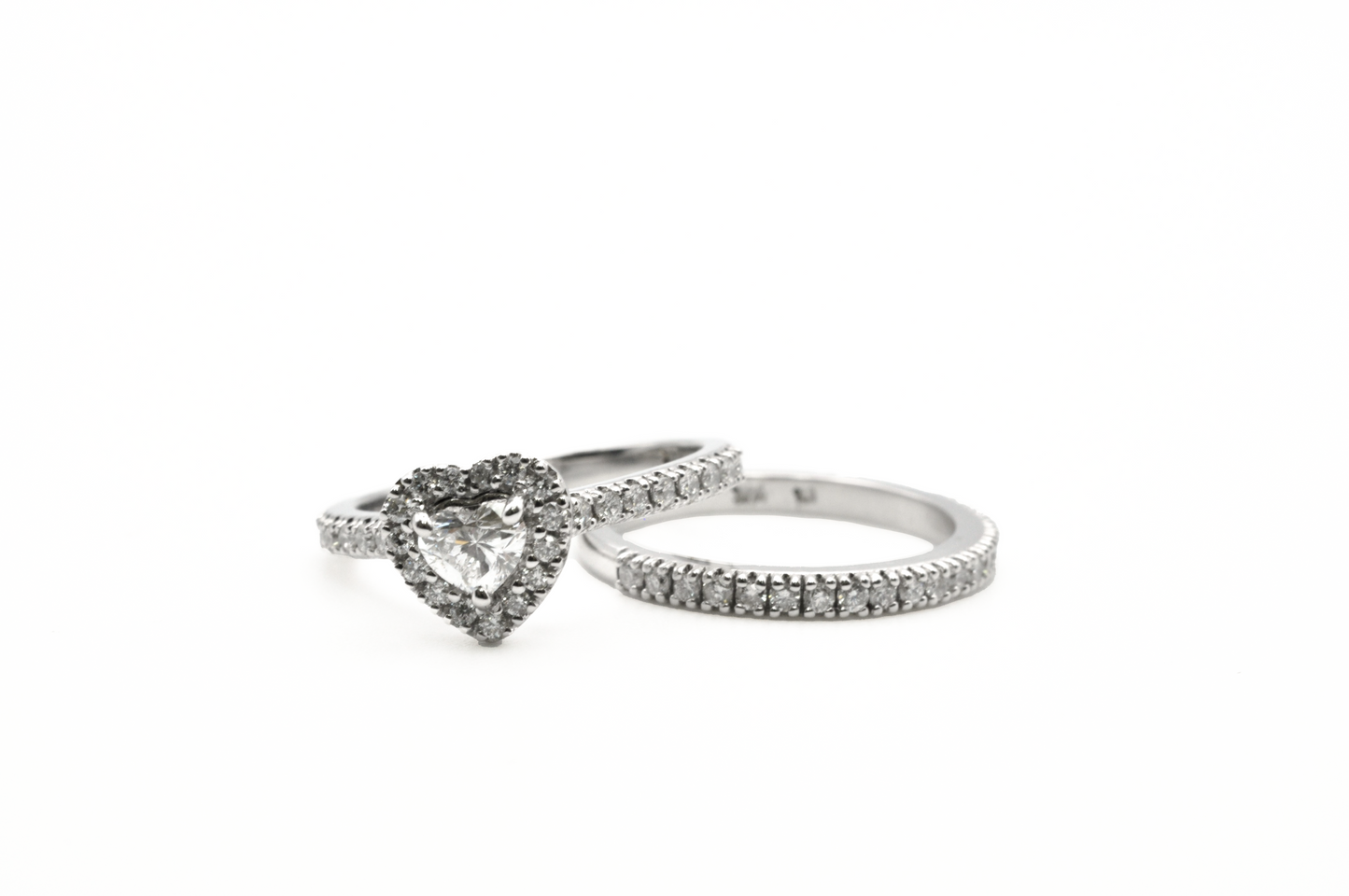 White Gold Heart Diamond with a Halo Engagement Ring and a Pave Diamond Wedding Band