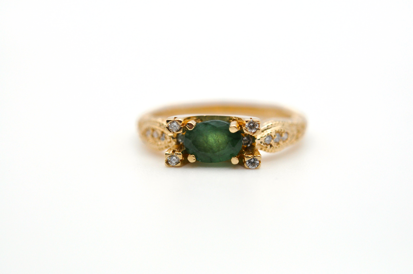 Unique Yellow Gold Vintage Oval Emerald Ring with Diamond Accents