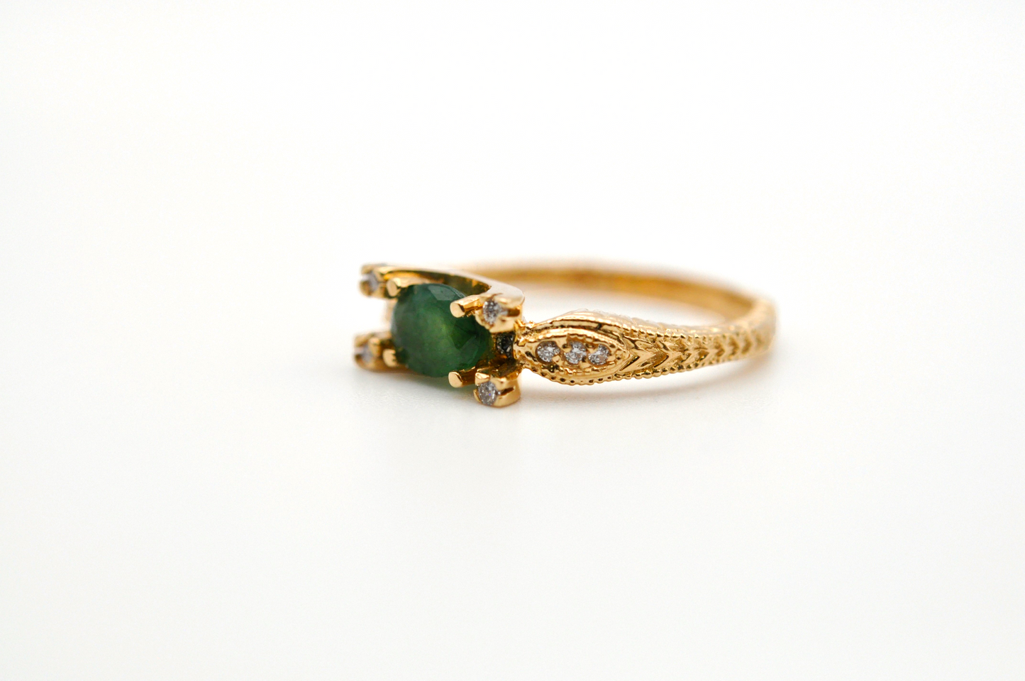 Unique Yellow Gold Vintage Oval Emerald Ring with Diamond Accents