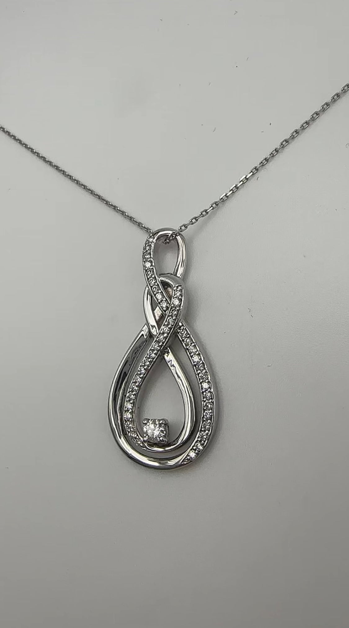 Modern Diamond Swirl Pendant